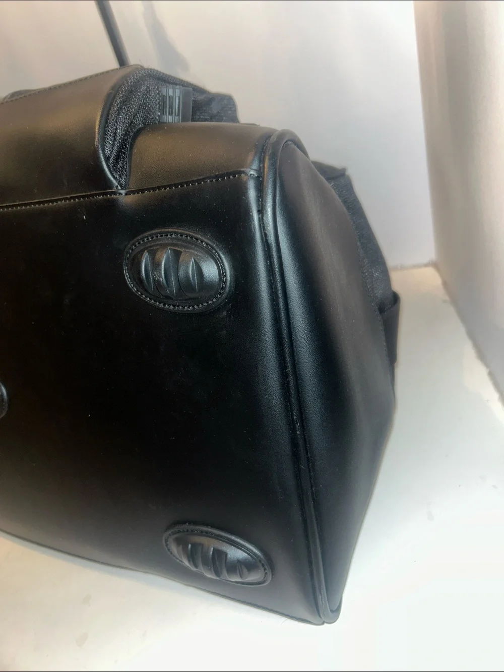 Tumi Black Duffel Bag with Red Logo Accent